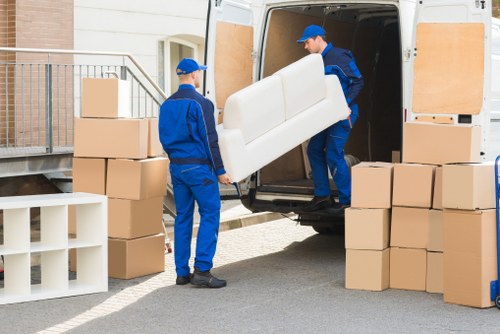 Removal team pricing a move in Roehampton residential area