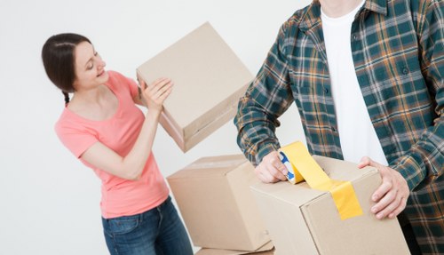Professional team handling piano removals in Roehampton home