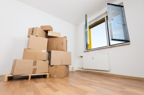 Packed moving boxes prepared for removal services in Roehampton