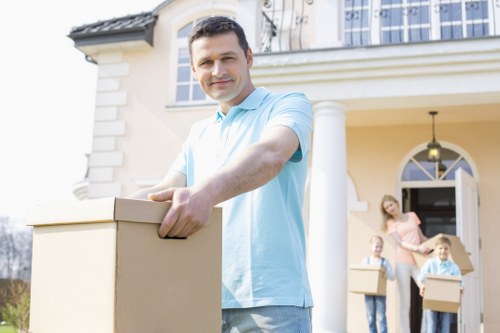House removalists in Roehampton packing moving boxes in a residential home