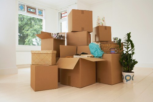 Packed moving boxes prepared for a Roehampton house relocation