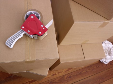Professional movers handling furniture during a quick relocation in Roehampton