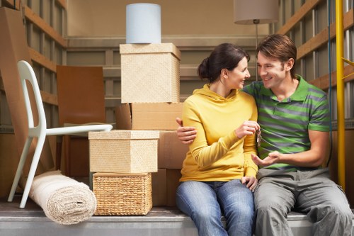 Planning a home move with packed boxes in Roehampton
