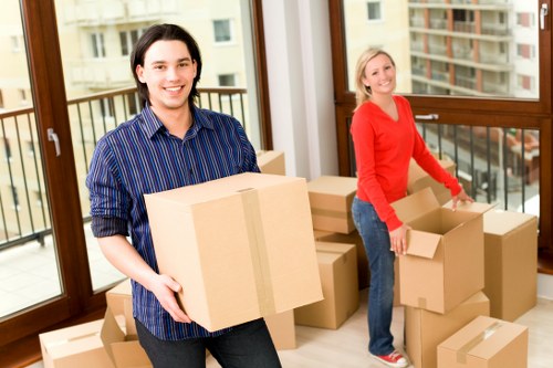Staff using PPE during a professional removal service